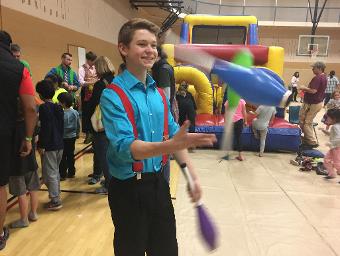 Logan juggling clubs