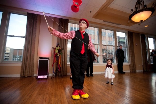 OMG Josh as a strolling juggler at a wedding.