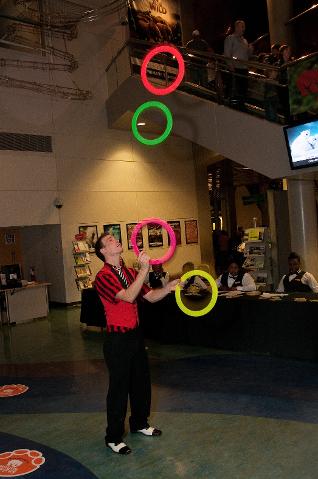 'Mazing Matthias juggling rings at a gala event
